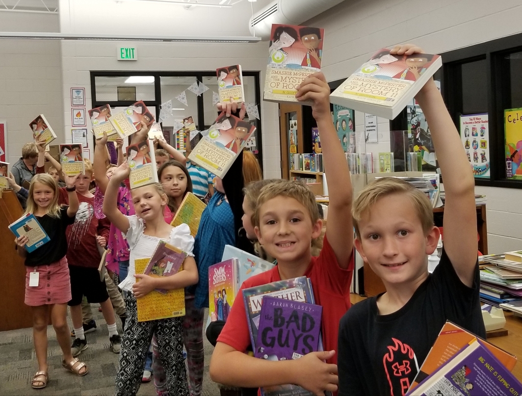kids holding books