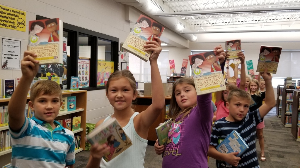 kids with new books