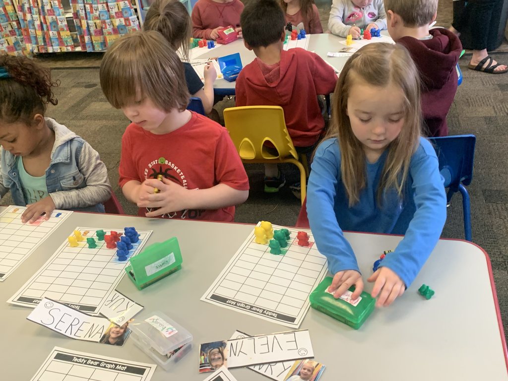 Webster preschoolers with Mr. Schmitz are busy learning about graphing and how to make bar graphs!