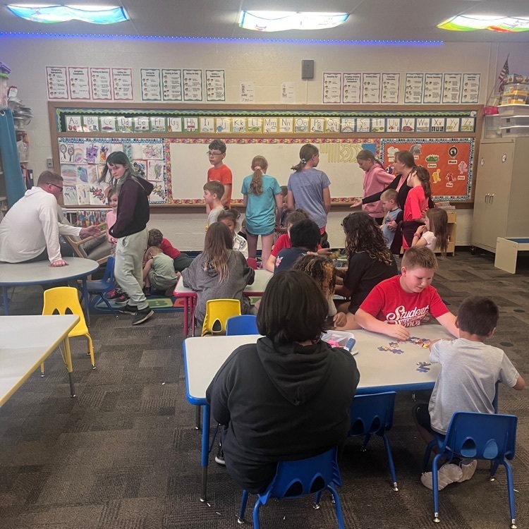 Webster 5th graders enjoying playtime with Mr. Schmitz's morning preschool class! #toys #puzzles #goodbyesong