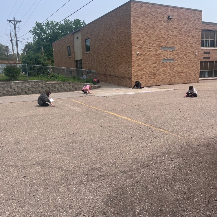 Webster 5th graders publishing their poems using sidewalk chalk! 