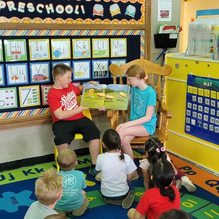 Webster student council members read books to the preschool and junior kindergarten classrooms. These are the 5th grade student council members.