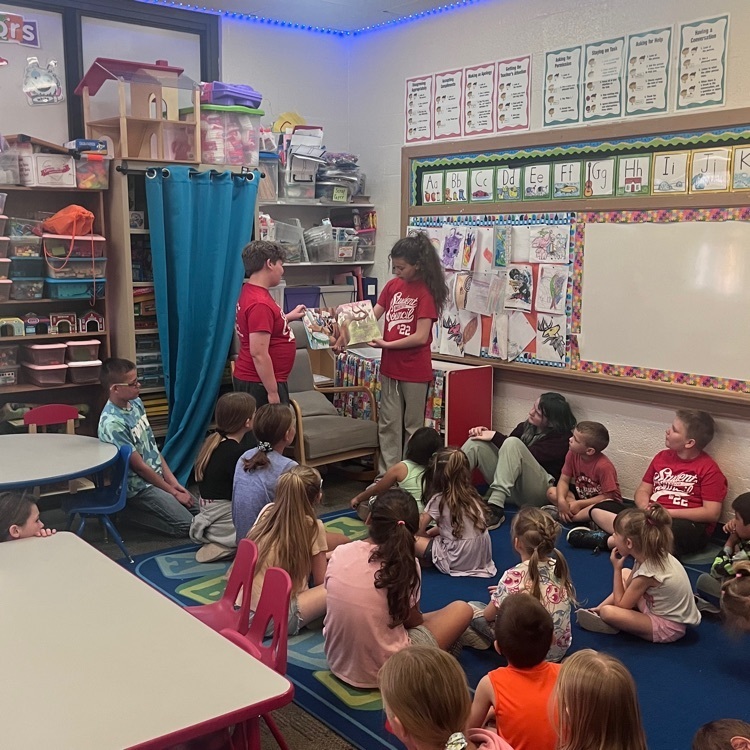 Webster student council members read books to the preschool and junior kindergarten classrooms. These are the 5th grade student council members. 