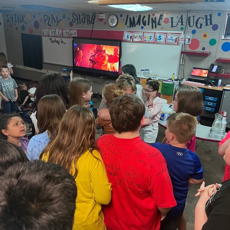 Saying goodbye to their 2nd grade teacher!