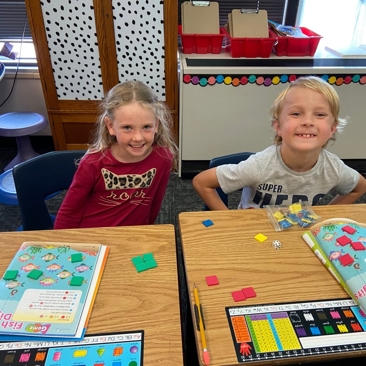 Second graders at Beadle enjoy playing a math game with a partner! 